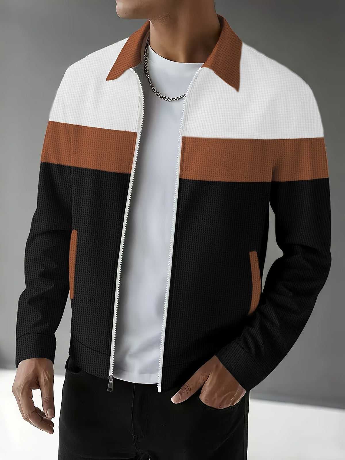 Men's colorblock zip jacket shown from the back