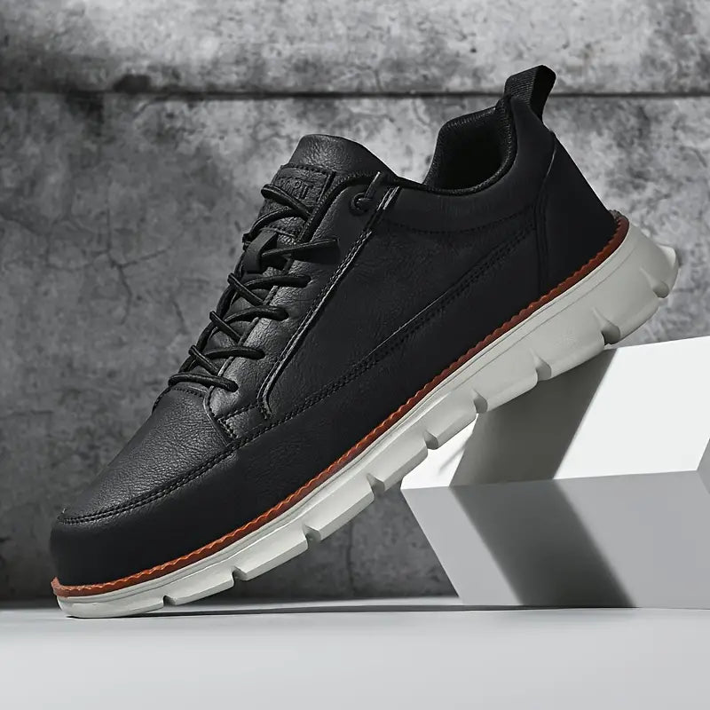 Close-up of men's sneakers showing the lace-up design
