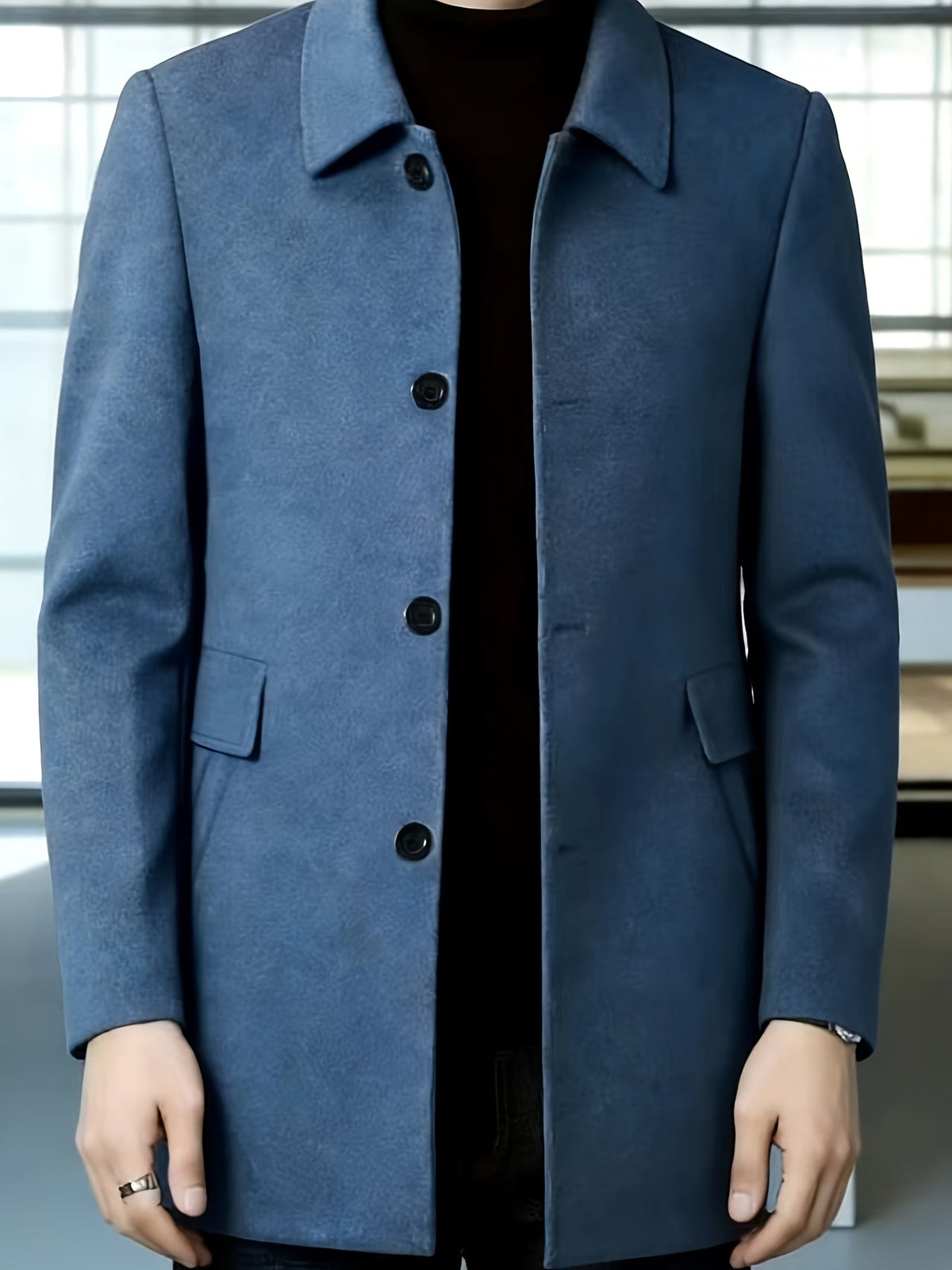 Side view of a tailored men's long coat