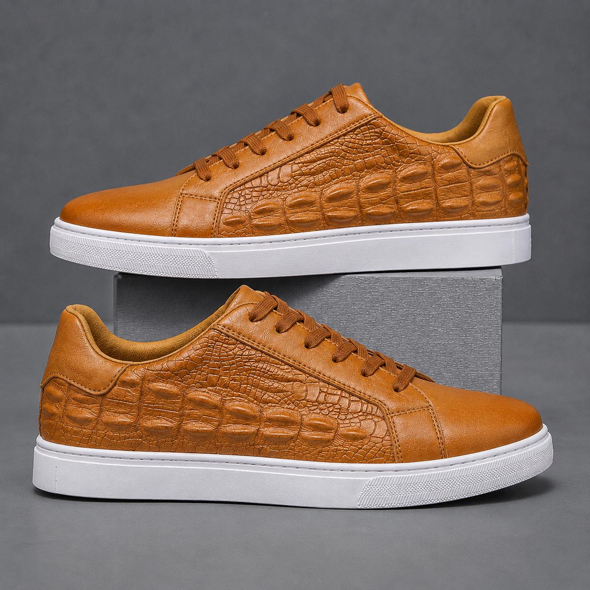 Crocodile texture leather court sneakers shown as a pair