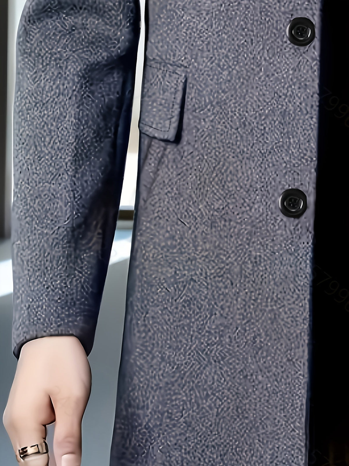 Full-length view of a men's single-breasted coat