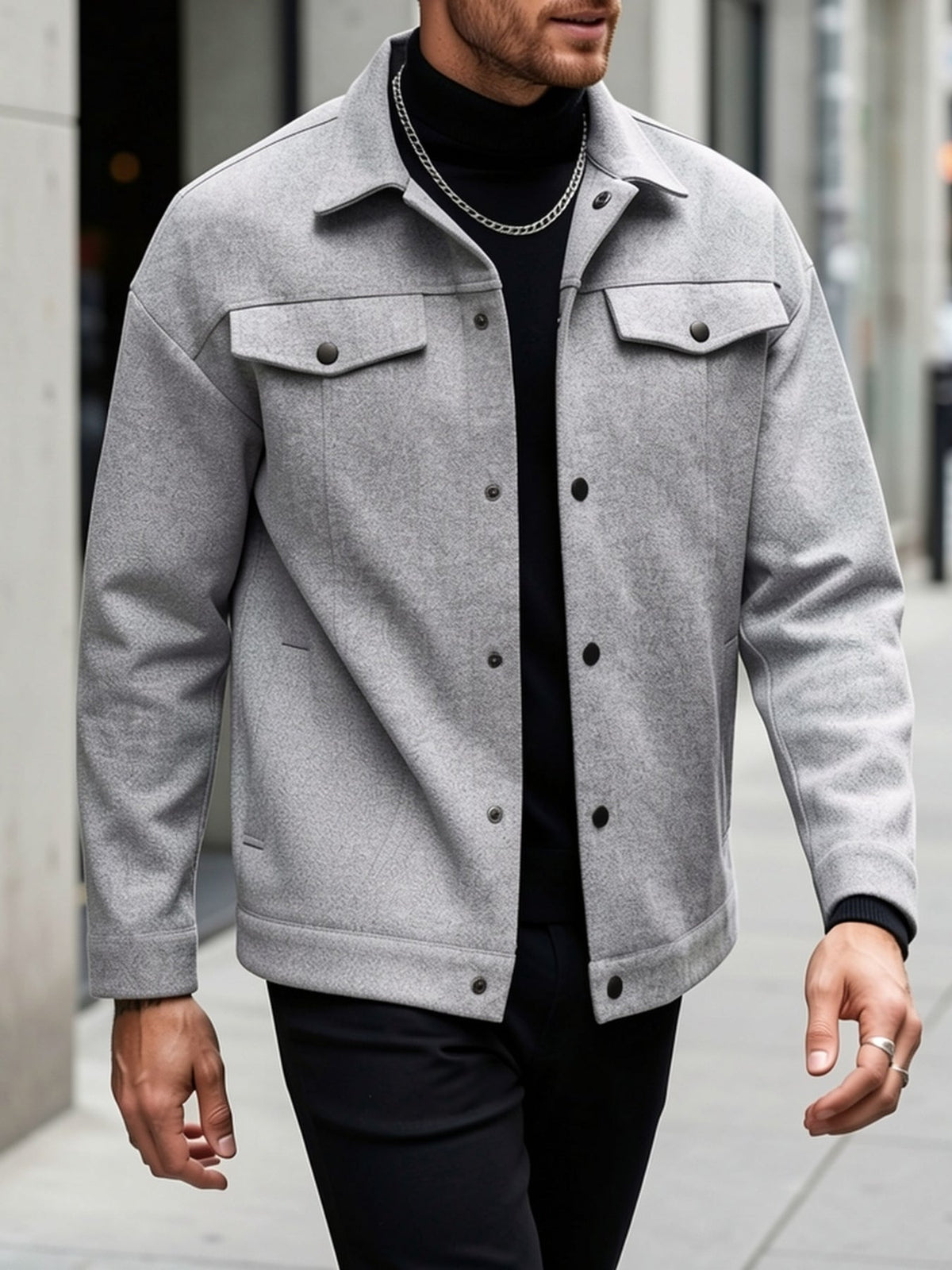 Detail view of the men's transitional jacket neckline