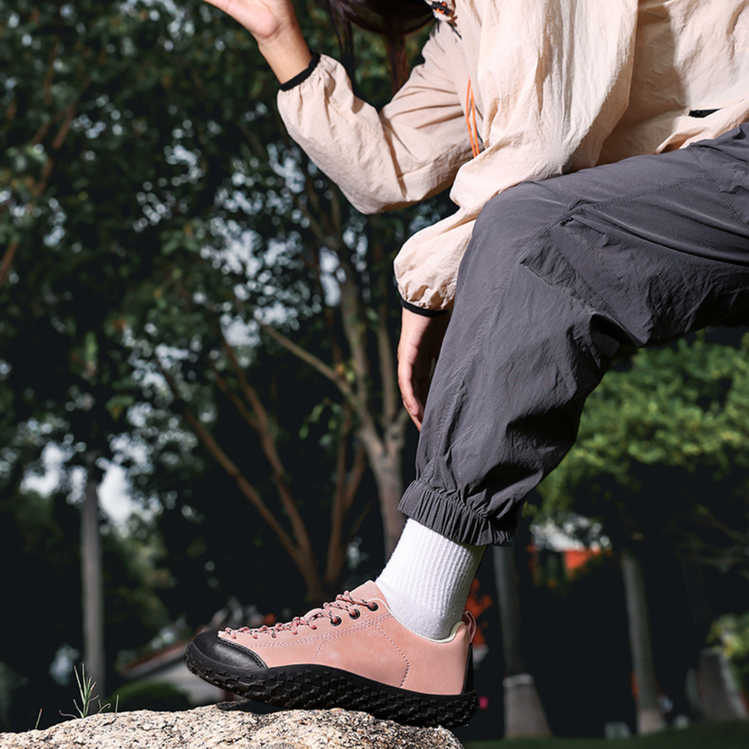 Men's barefoot hiking shoes shown from above with a roomy toe area