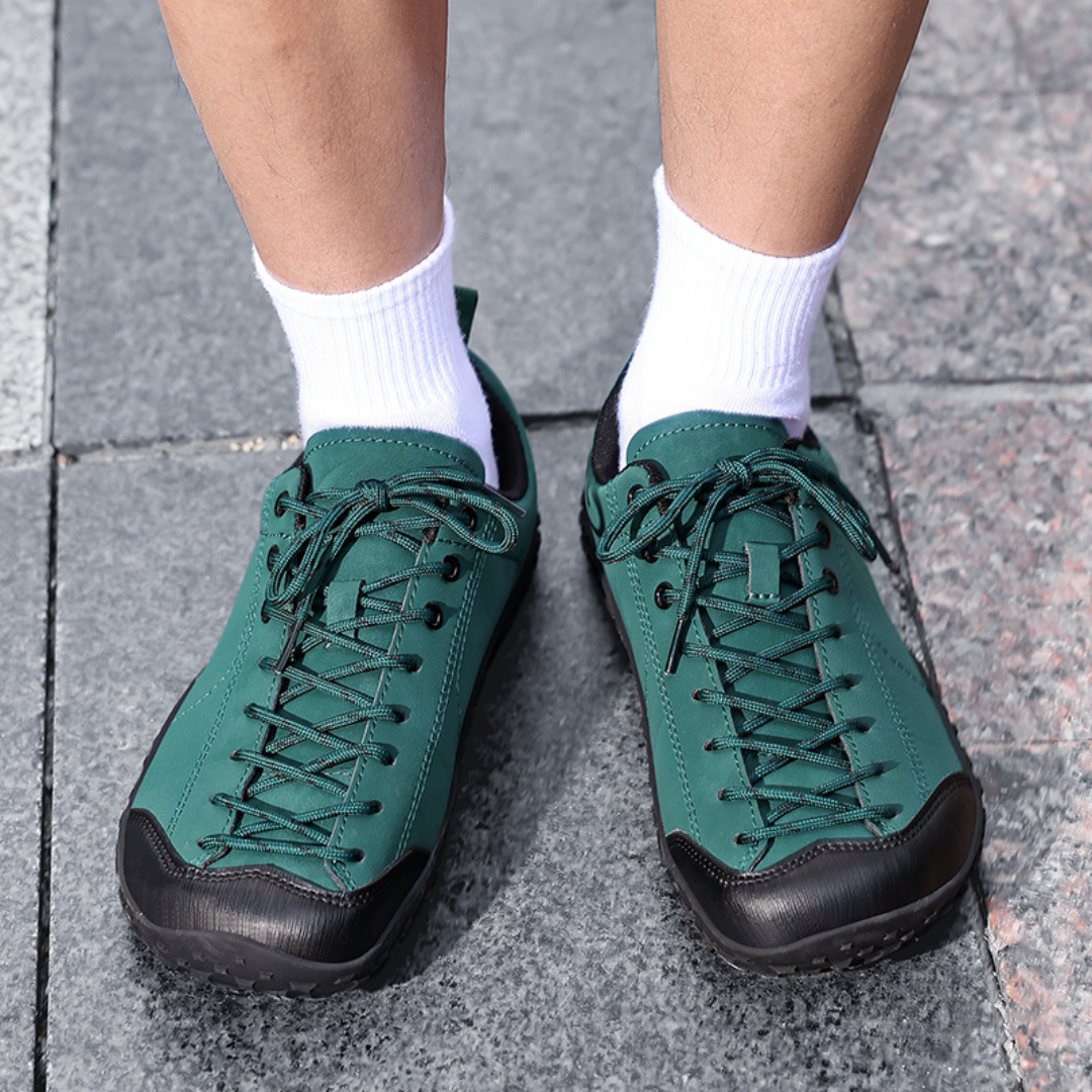 Water-resistant men's hiking shoes ready for walking on outdoor paths