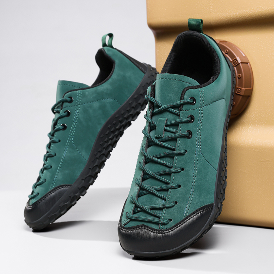 Side view of men's hiking shoes showing the flexible sole and streamlined design