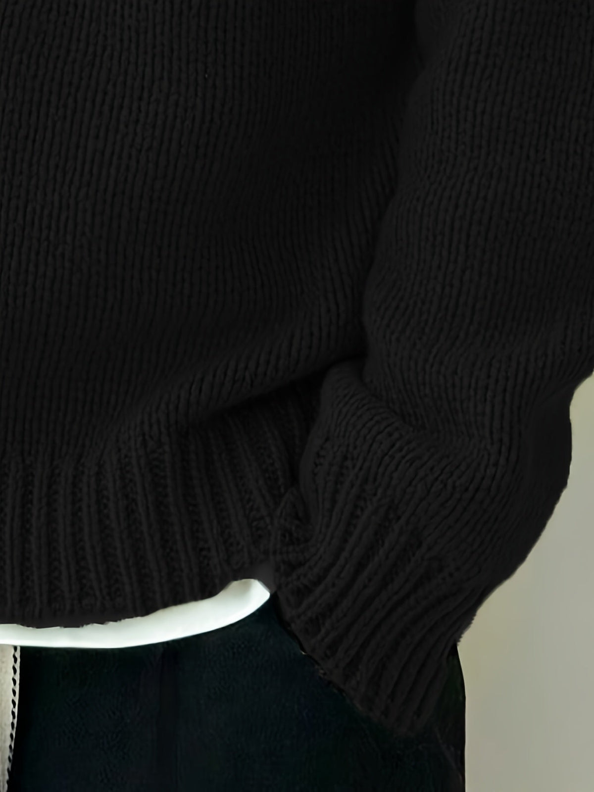Textured knit sweater detail with relaxed styling