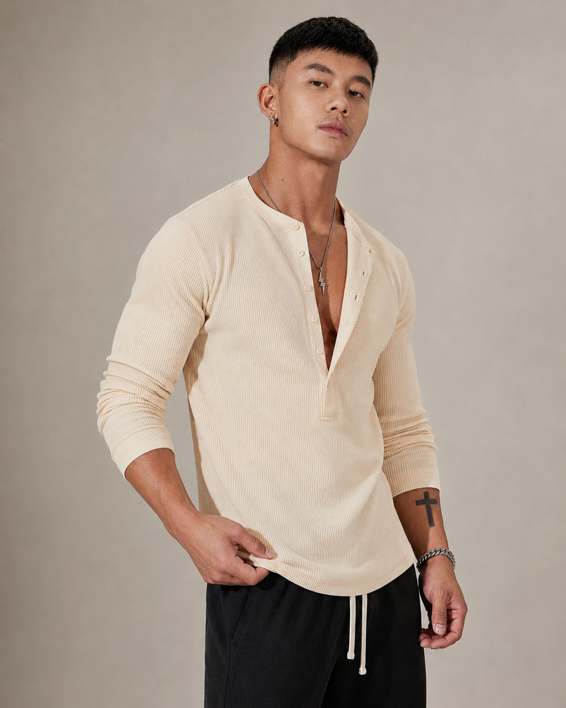 Front view of a women's ribbed knit half-button sweater