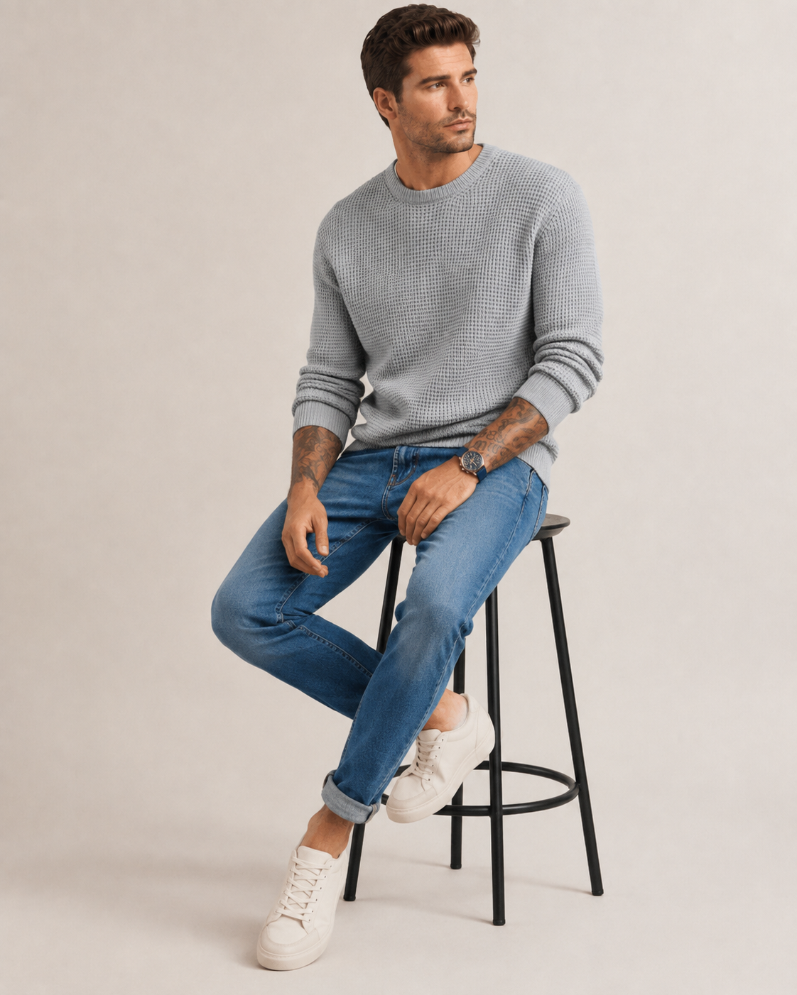 Side view of a men's long sleeve knit pullover