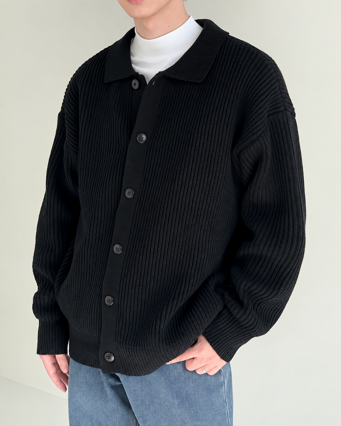 Close-up of the cardigan collar and button front
