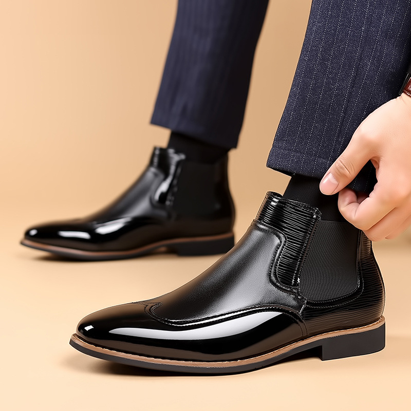 Men's classic Chelsea boots shown together from the rear