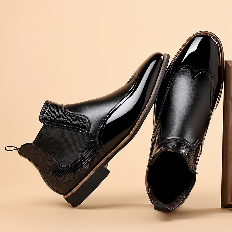 Detailed view of the smooth upper and rounded toe on a Chelsea boot