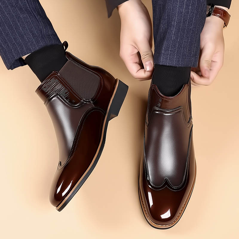 Close-up of the elastic side panel on a classic Chelsea boot