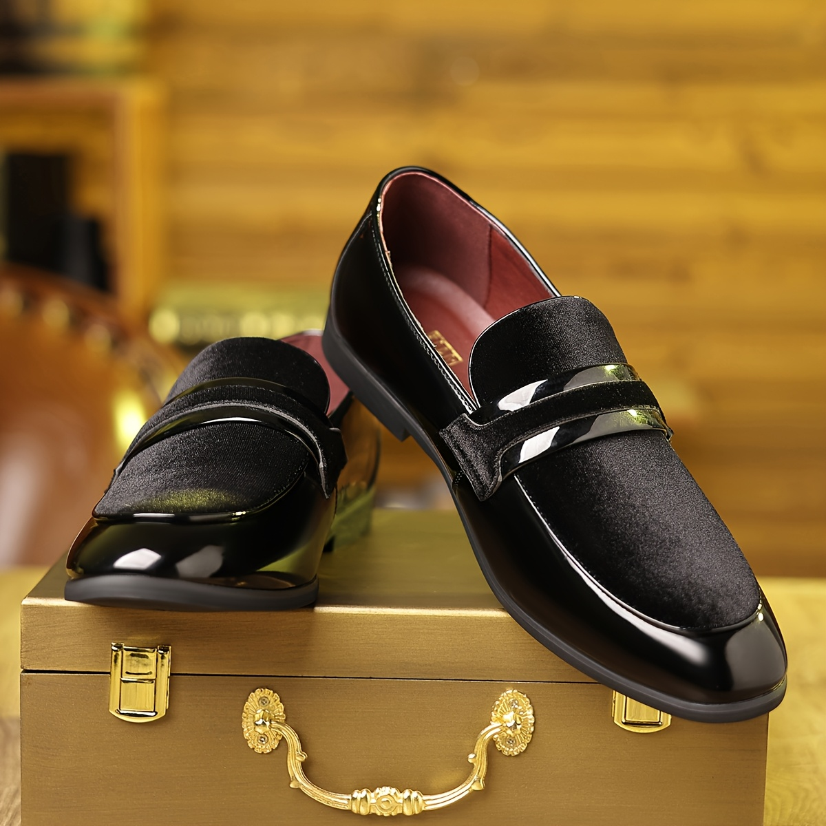 Front view of patent leather contrast panel loafers