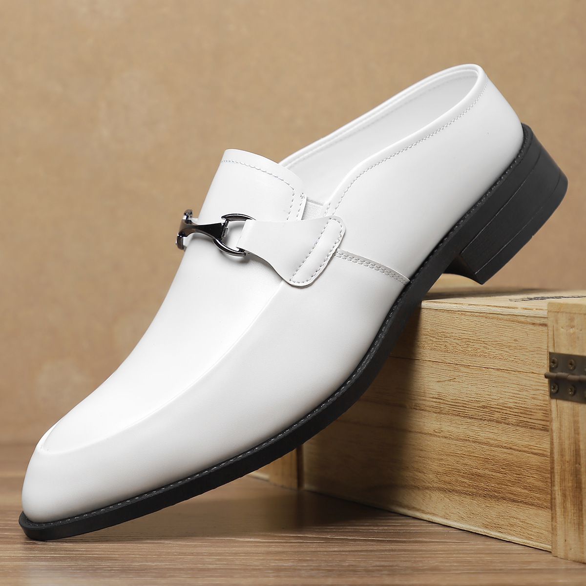 Angled view of polished leather loafers