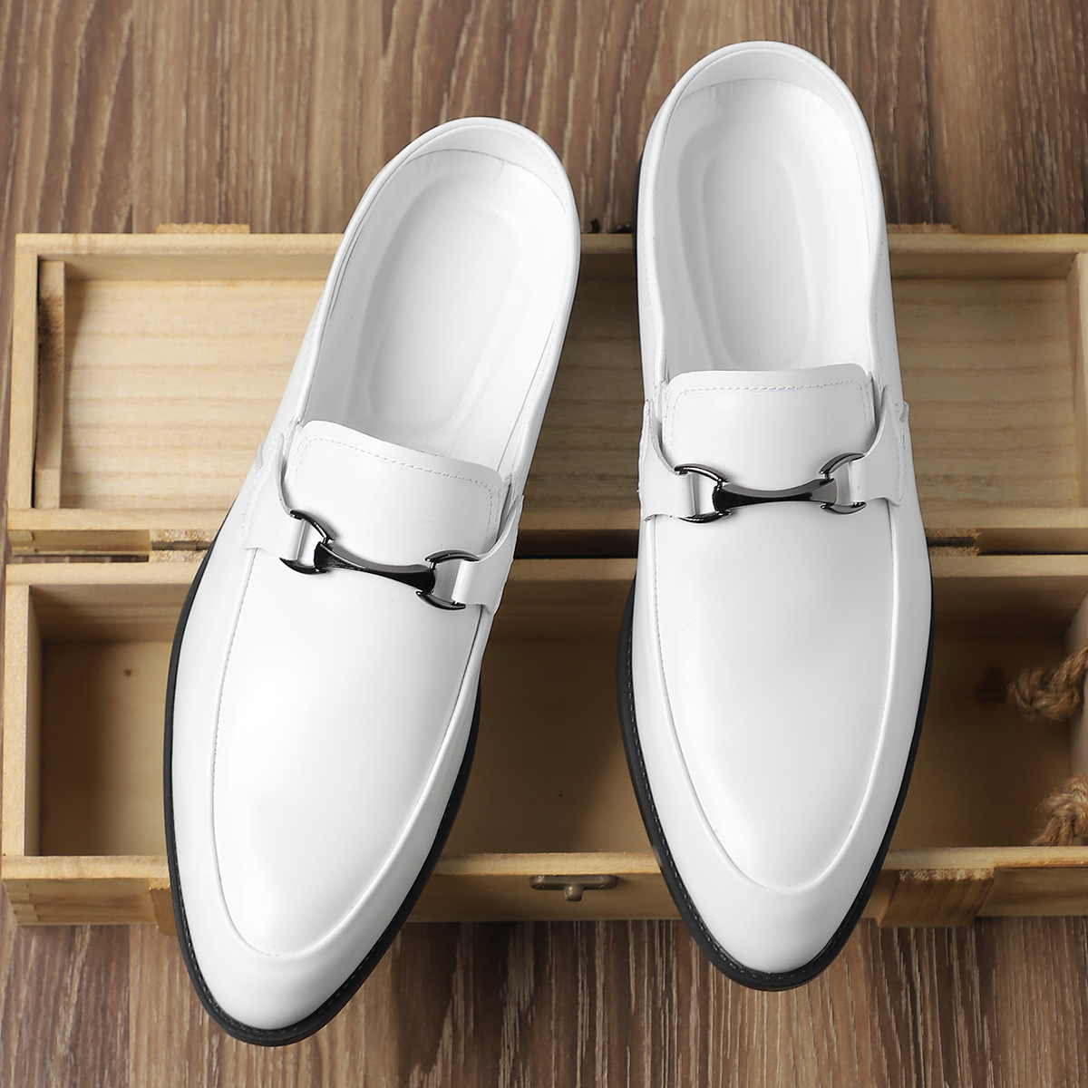 Pair of leather loafers with sleek metal accents