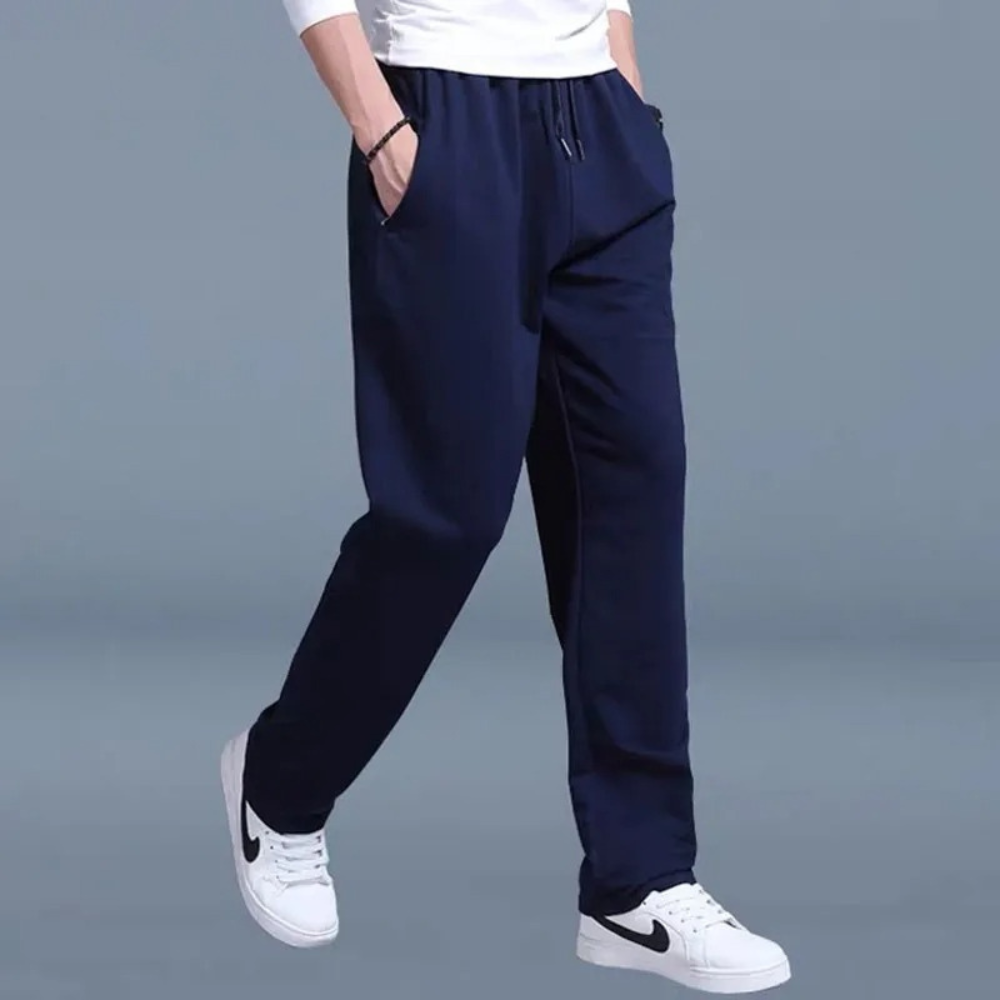 Men's drawstring jogger pants with side pockets shown from the front