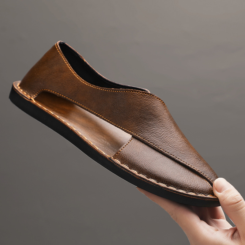 Pair of crossover flat sandals displayed together