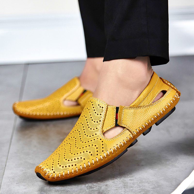 Pair of leather strap sandals displayed together