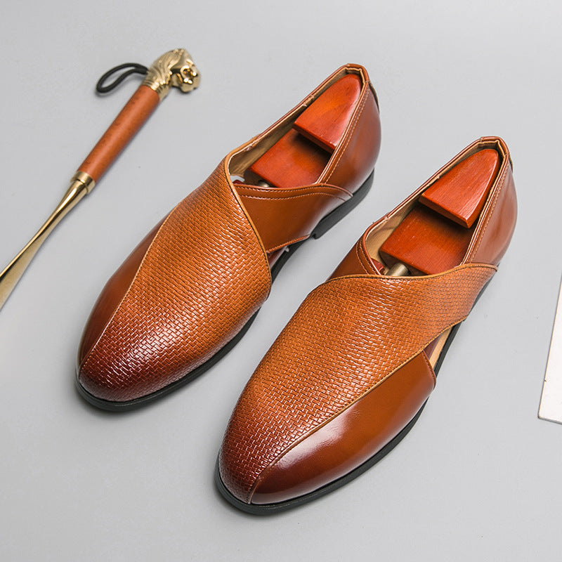 Front view of leather loafers with a sleek rounded toe