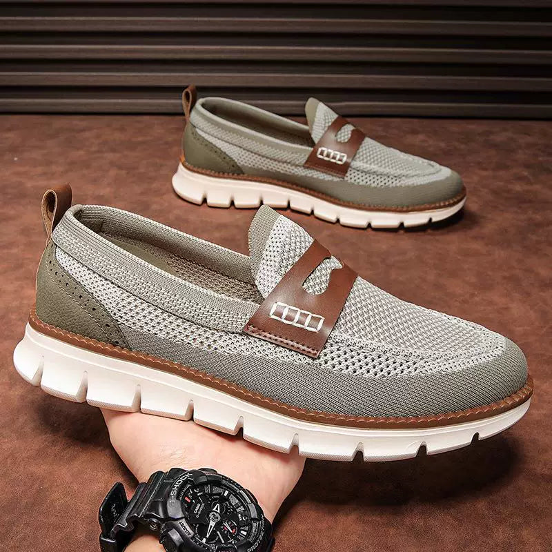 Pair of men's mesh penny loafers displayed together
