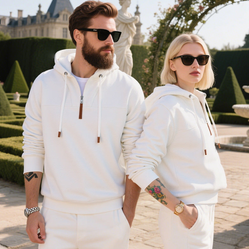 Men's fleece hoodie with leather zipper shown at the chest