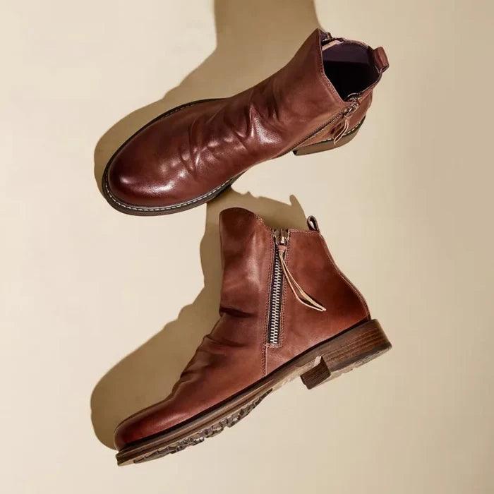Men's leather boots viewed from above with a clean everyday silhouette