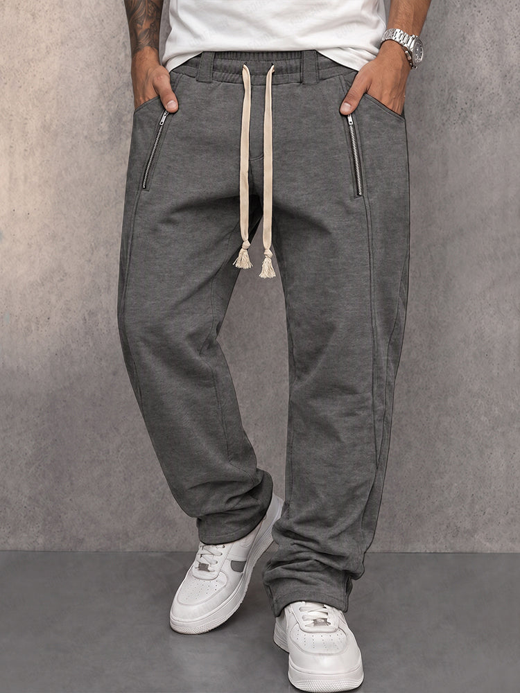 Close-up of zipper accents on athleisure sweatpants