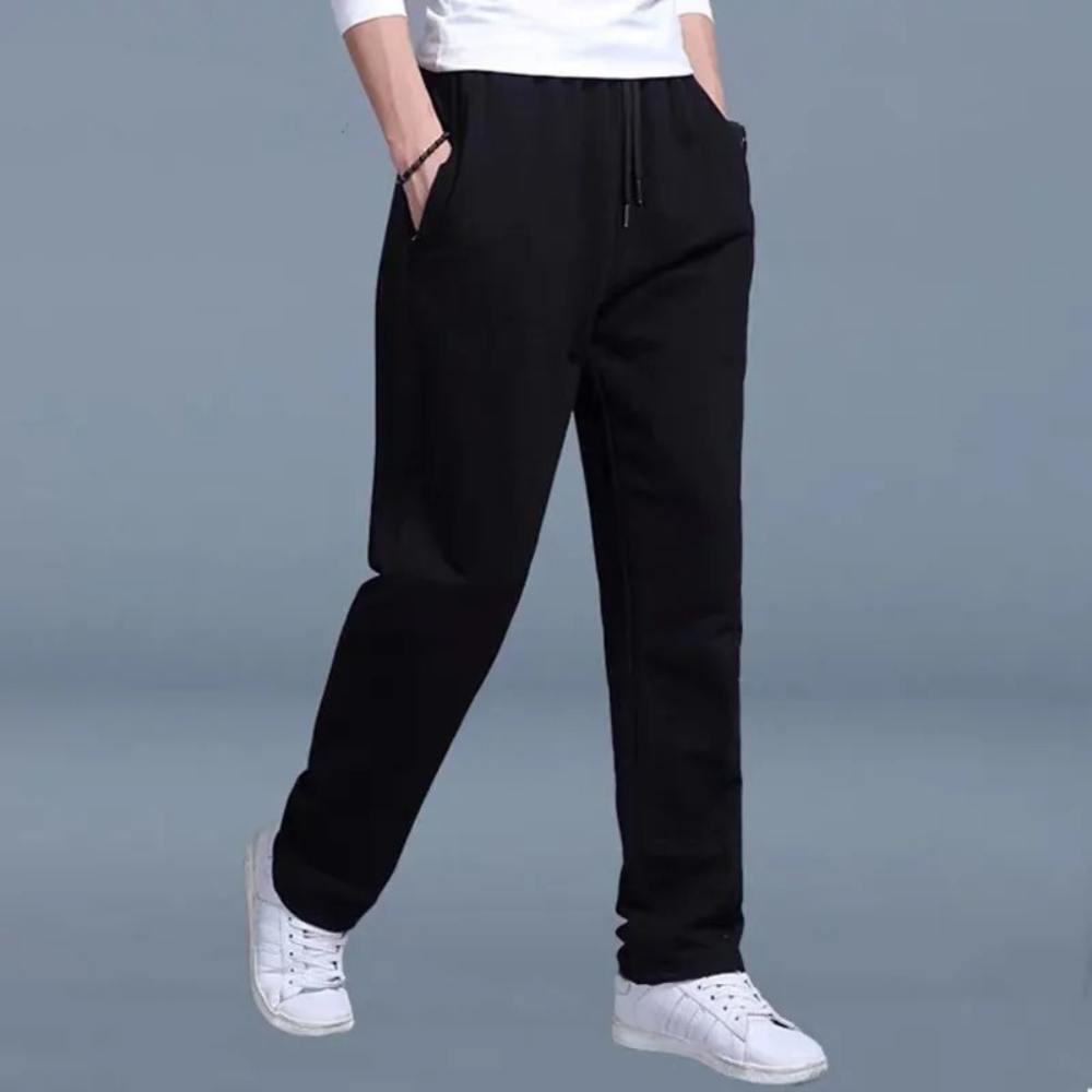 Men's jogger pants shown from the back with a relaxed fit