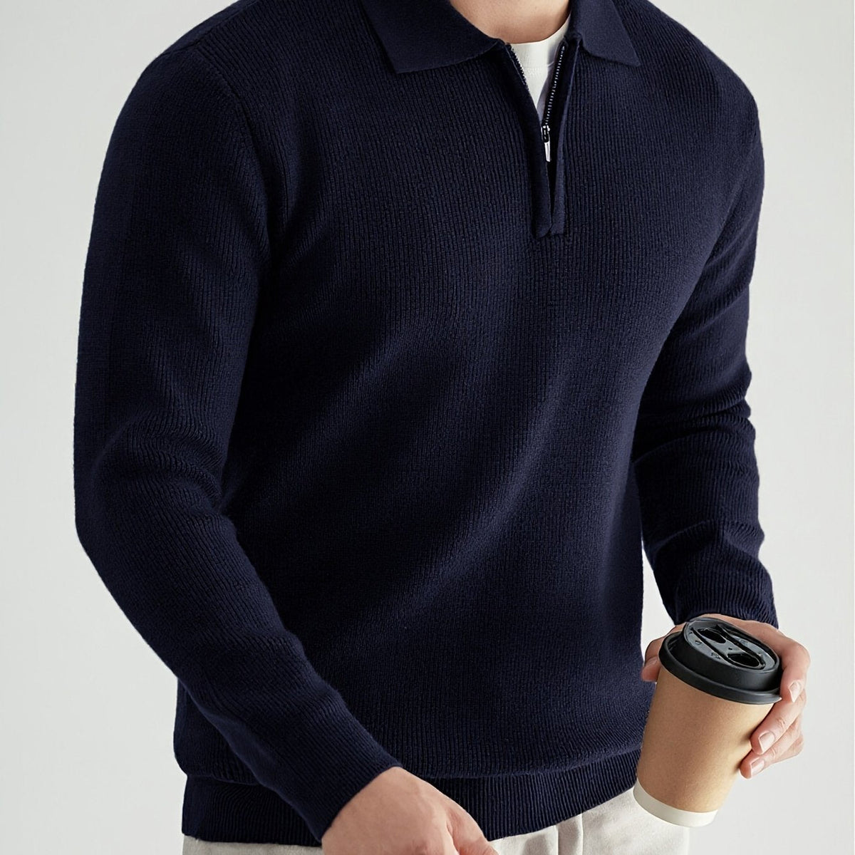 Full view of the men's knit quarter-zip polo sweater