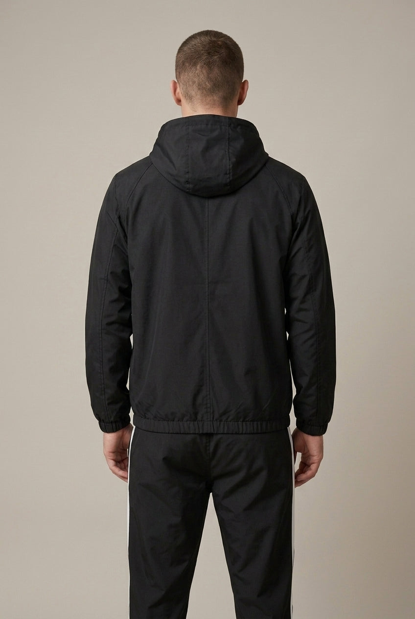 Men's two-piece tracksuit featuring a hooded jacket and tapered joggers