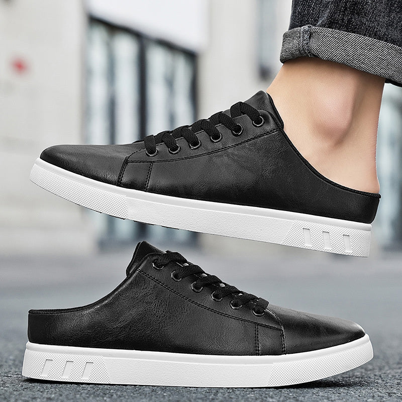 Leather mule sneakers displayed together with white soles visible