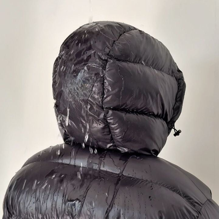Back view of a men's hooded puffer jacket