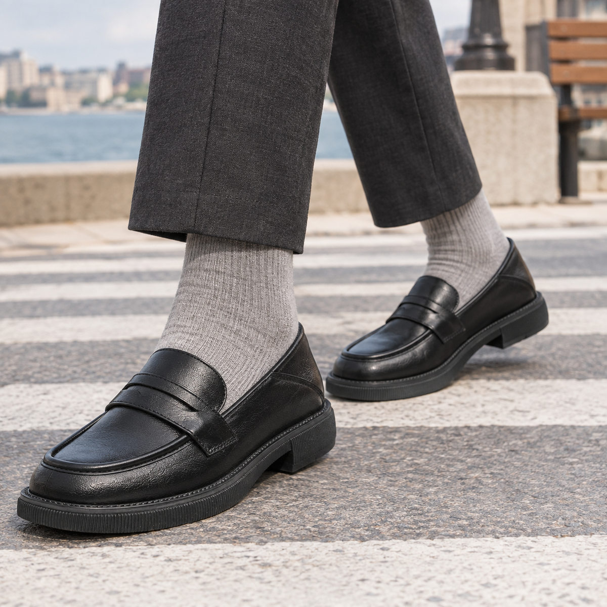 Leather-look slip-on loafers with a classic penny strap and low heel
