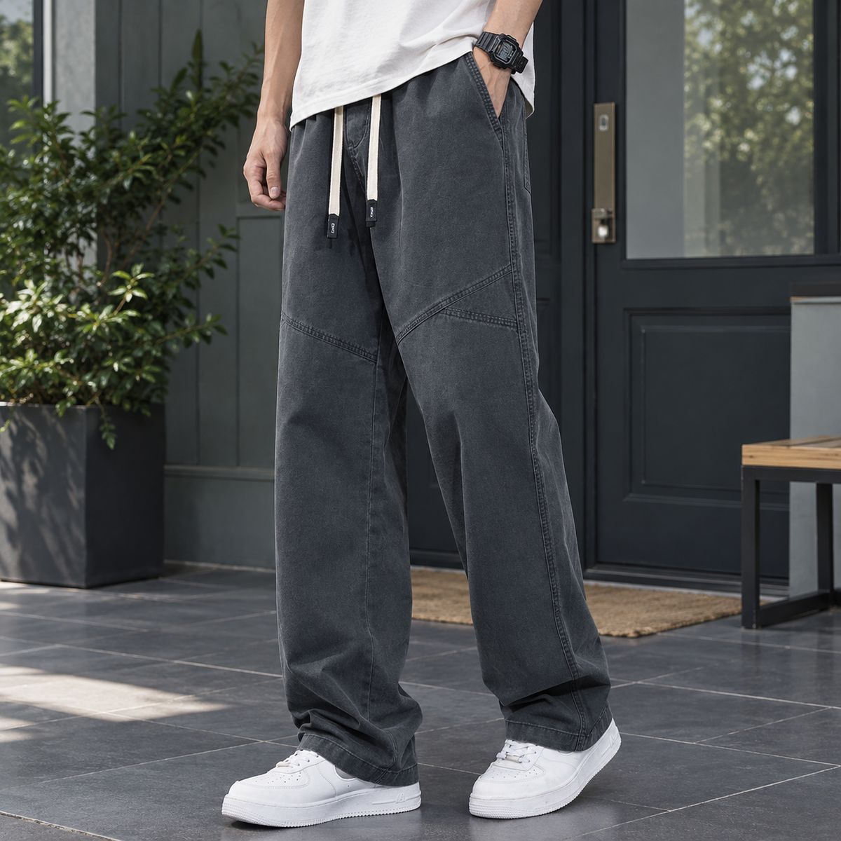 Relaxed straight-leg cotton pants shown from the front