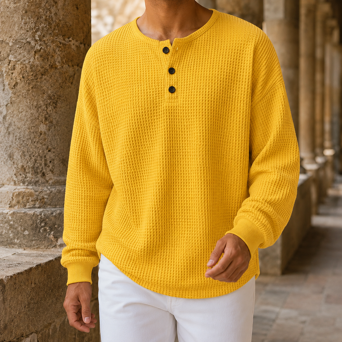 Close-up of the sweater's ribbed cuffs and textured knit