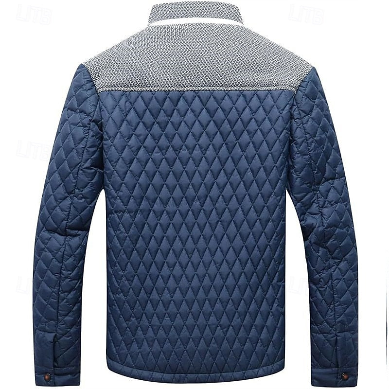 Detail view of the quilted texture on a men's stand collar jacket