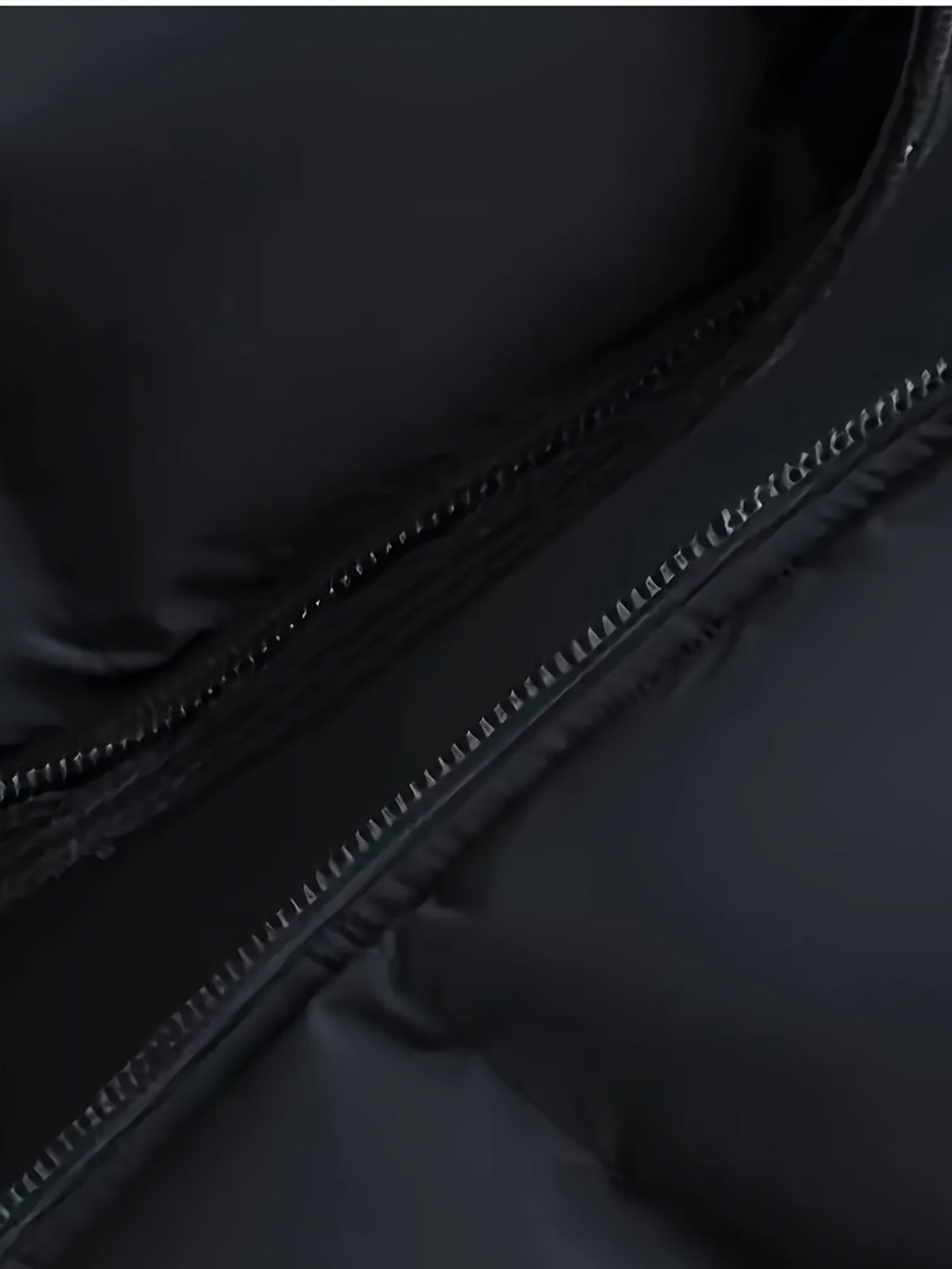 Men's oversized quilted outerwear jacket displayed in detail