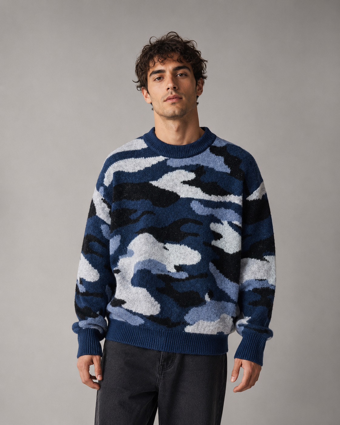 Men's camo knit sweater styled for casual streetwear