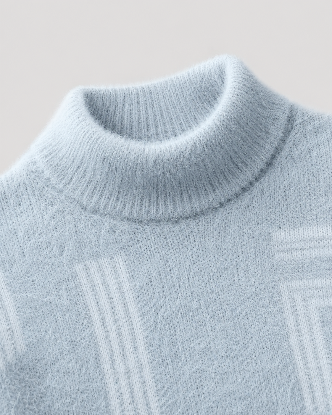 Detail view of the geometric pattern on the fluffy knit