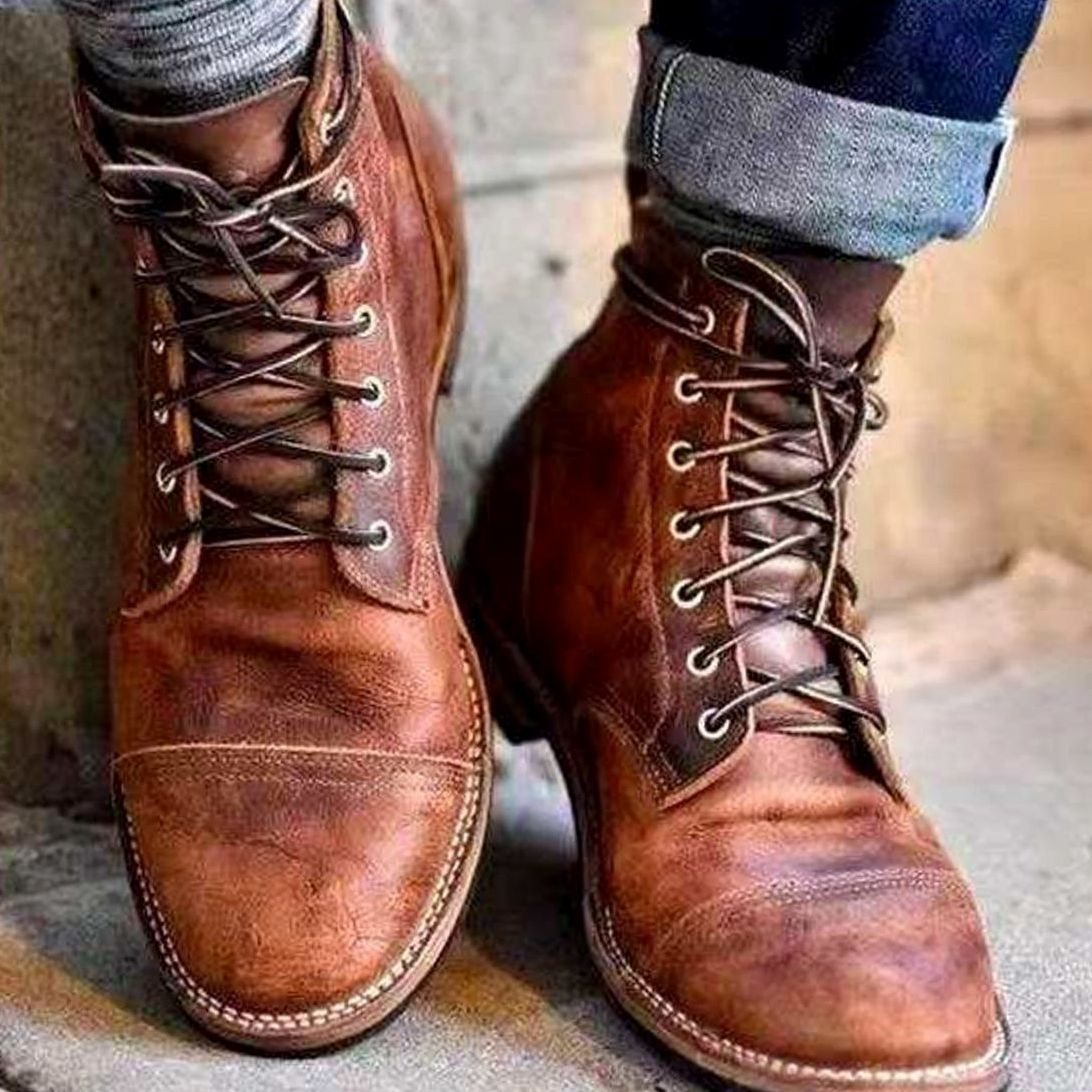 Men's winter ankle boots shown from the back with lace-up styling