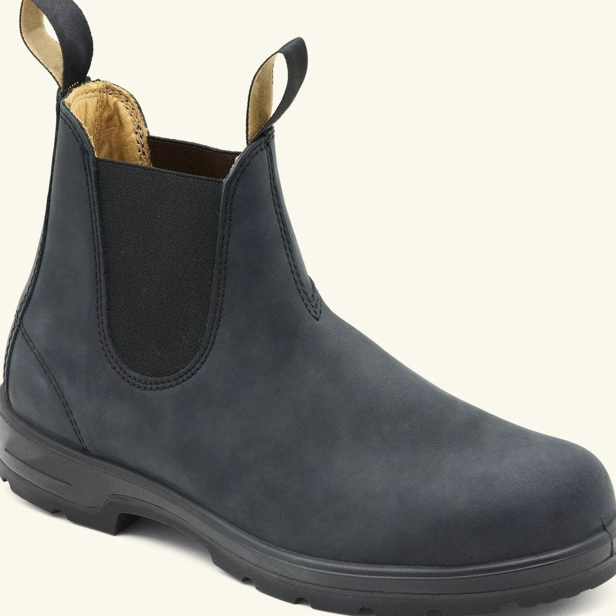 Pair of men's leather Chelsea boots displaying elastic side panels and pull tabs
