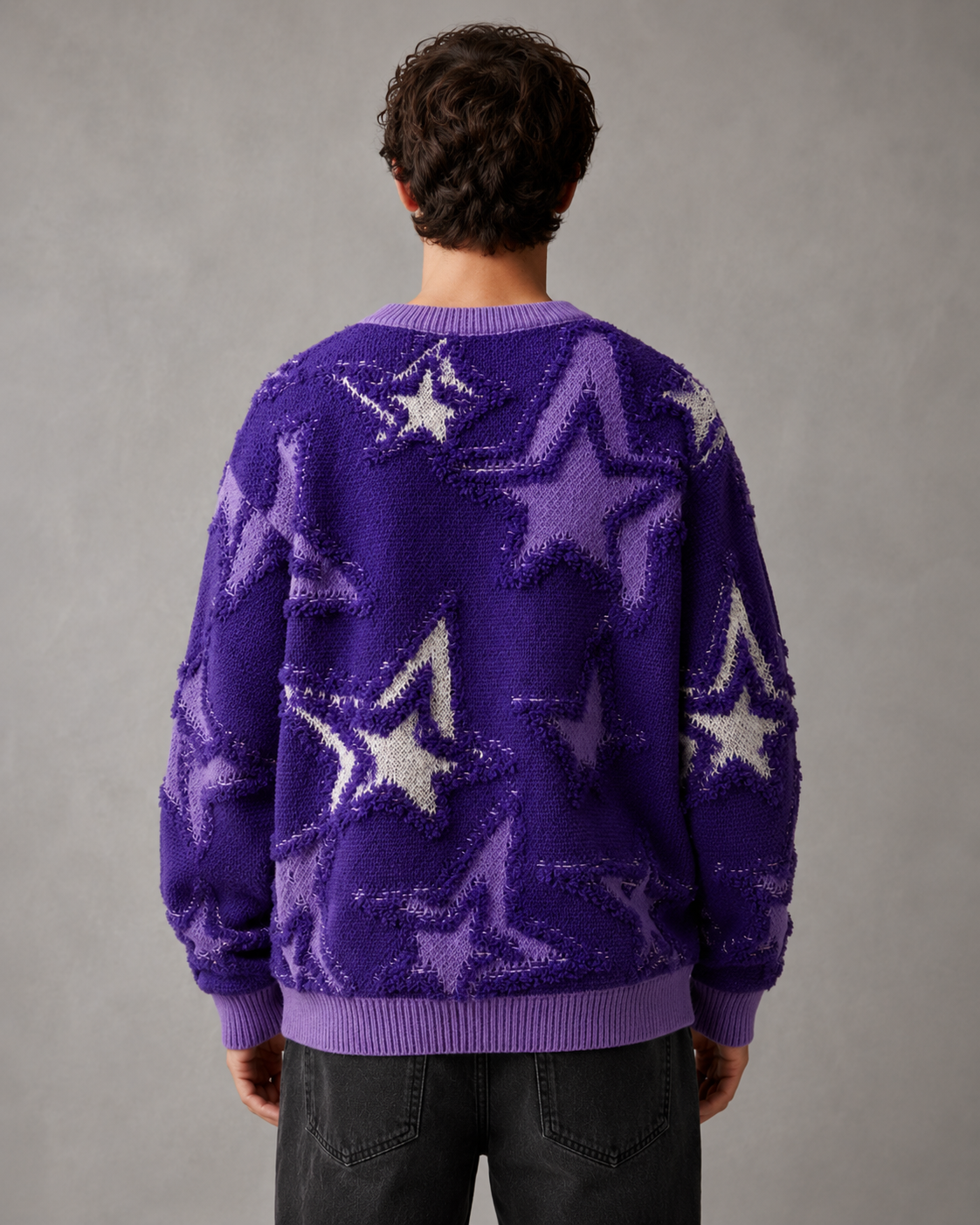 Close-up of the textured knit pattern and star design
