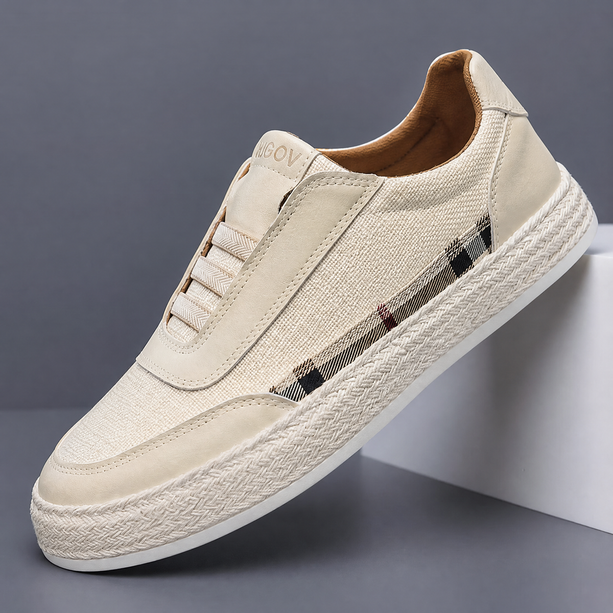 Top view of woven linen espadrille sneakers with leather details