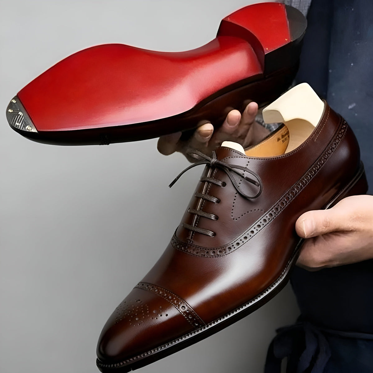 Minimal loafers arranged together to show their refined silhouette
