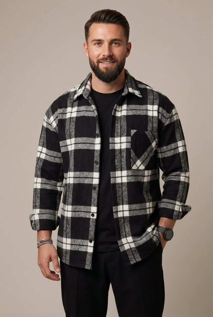 Side view of the men's checked overshirt showing its relaxed silhouette