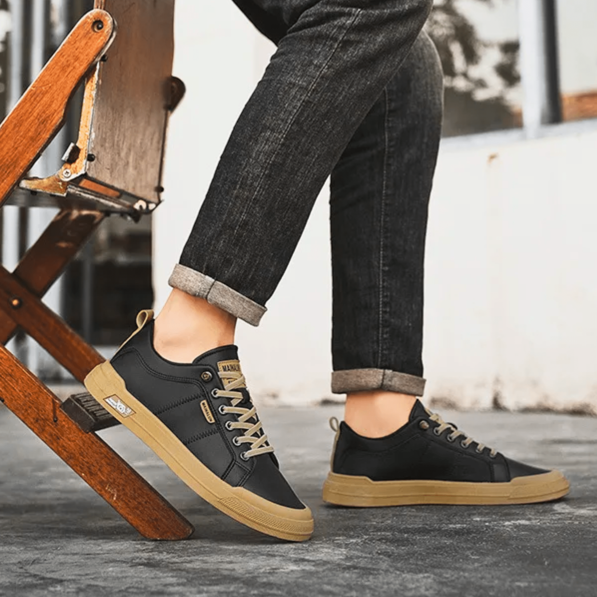 Pair of leather low-top sneakers with streamlined silhouettes